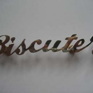 Leyenda  BISCUTER en metal